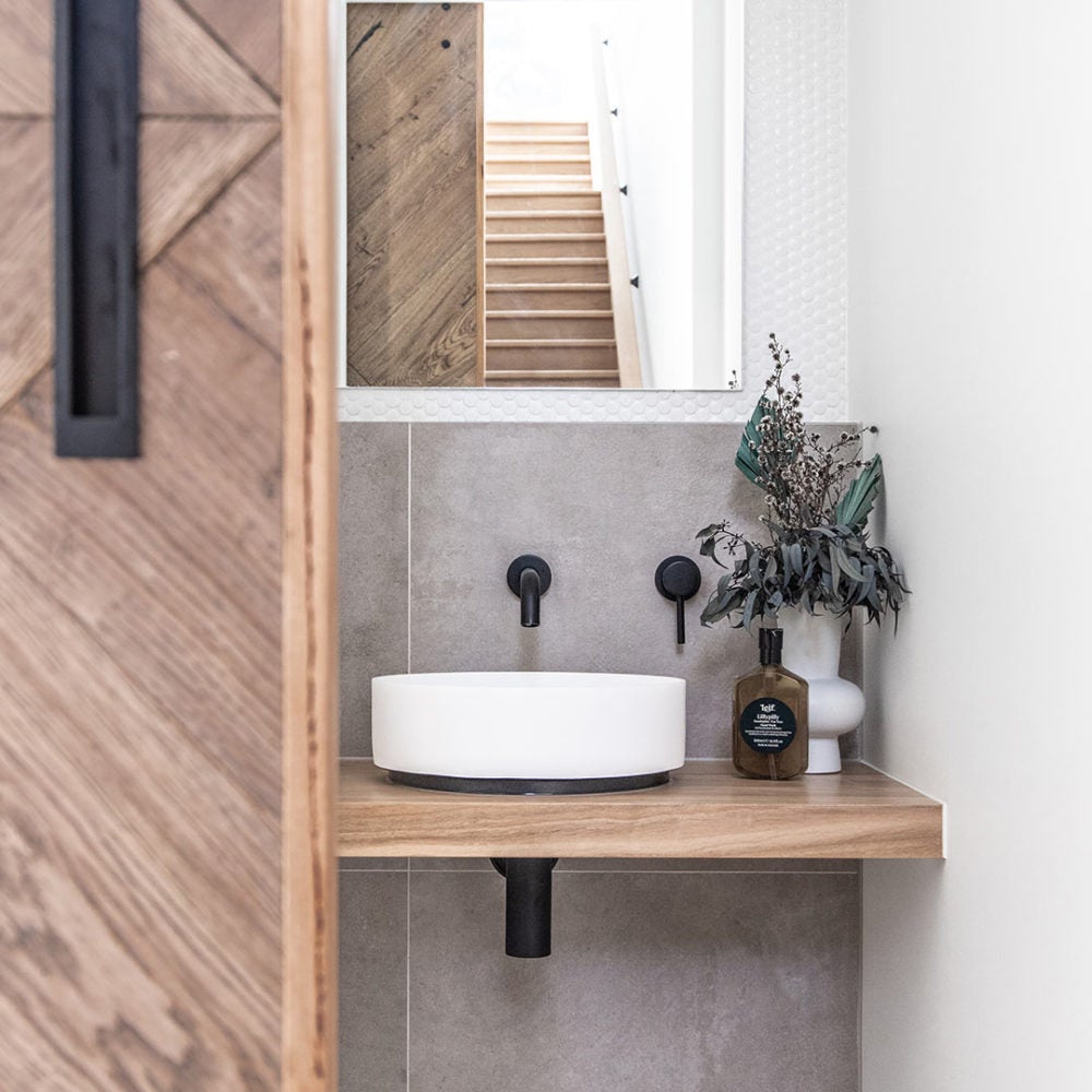 MICA Deluxe Bottle Trap Round Matte Black Basins Arova