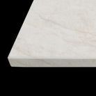 Ivory Taj Mahal vanity benchtop with warm natural veining and polished Aris edge profile